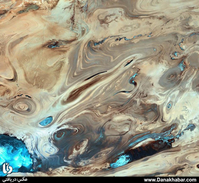 تصویری از کویر مرکزی ایران با دریاچه نمک در سمت چپ آن
