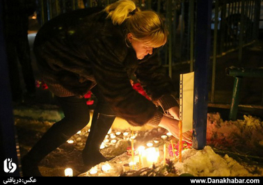 روشن کردن شمع برای گرامی داشت قربانیان حمله مسلحانه به مدرسه ای در مسکو
