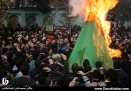 مراسم خیمه سوزانی ظهر عاشورا در محله منیریه تهران